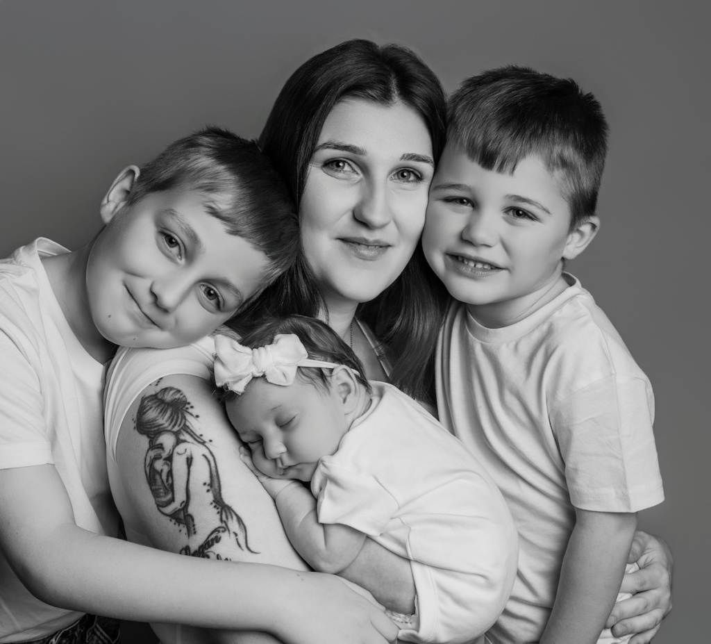 Family with newborn baby photographed at Level 11 studio in Ramsgate